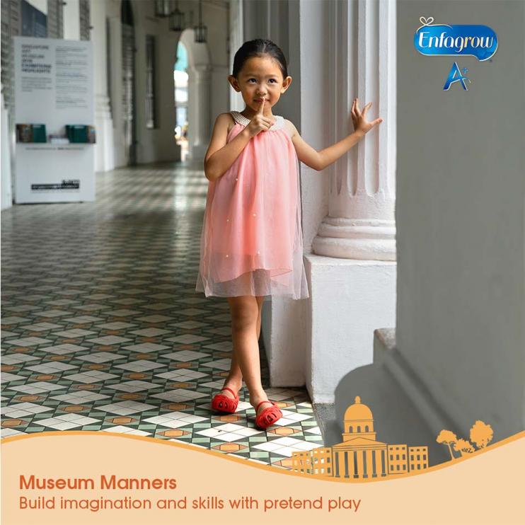 toddler learning at a museum