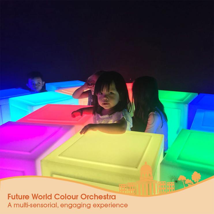 toddler playing with a colour orchestra