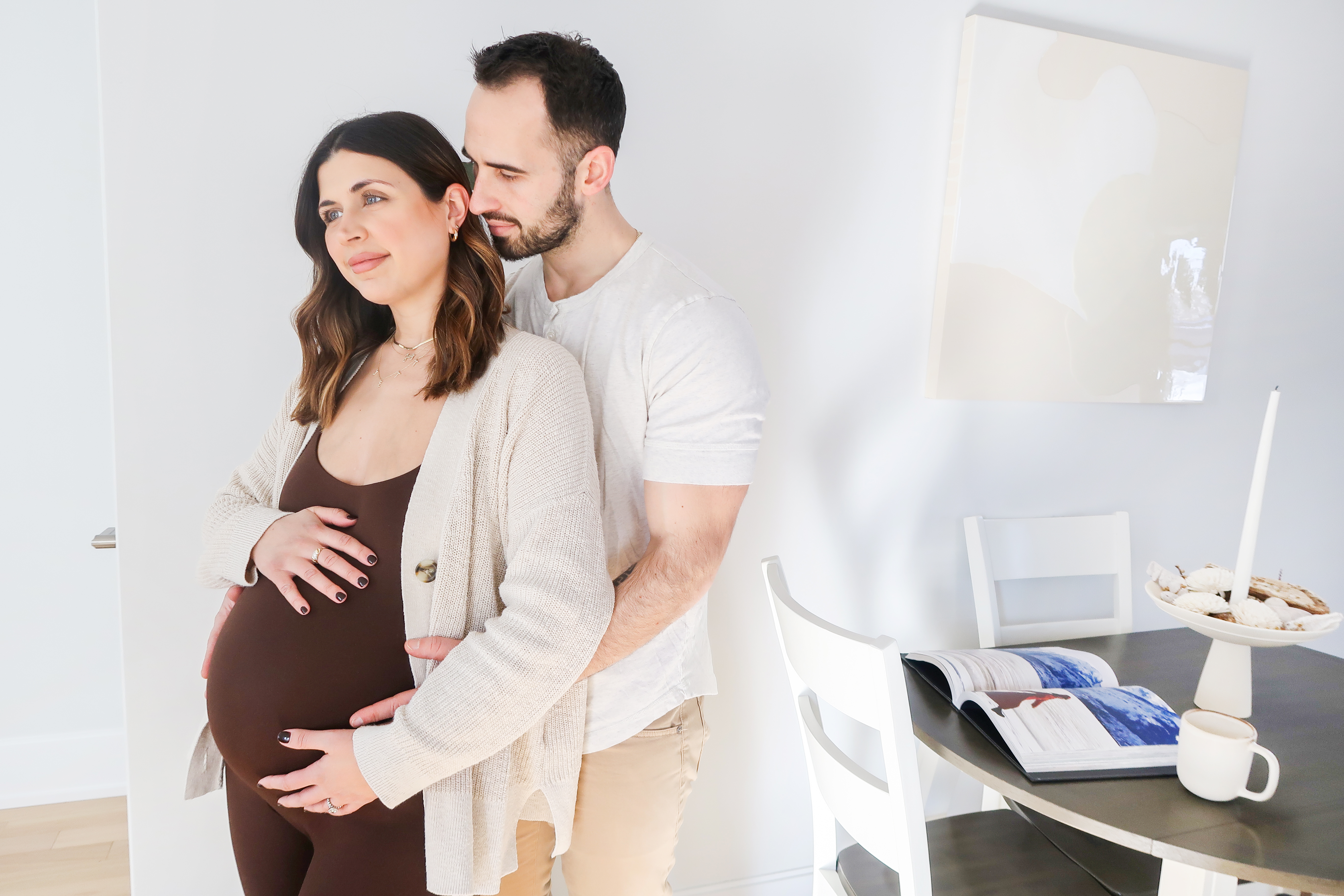 Importance of Nutrition During Pregnancy: Pregnant woman and partner in the kitchen