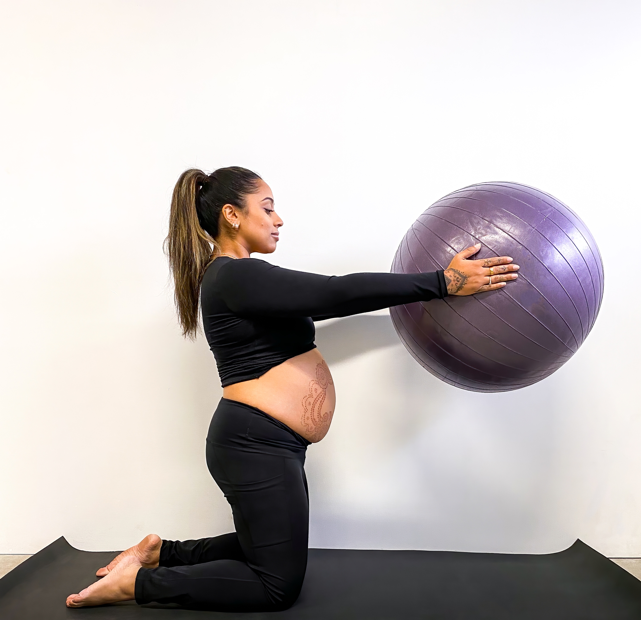 Mother does simple exercise for pregnant women